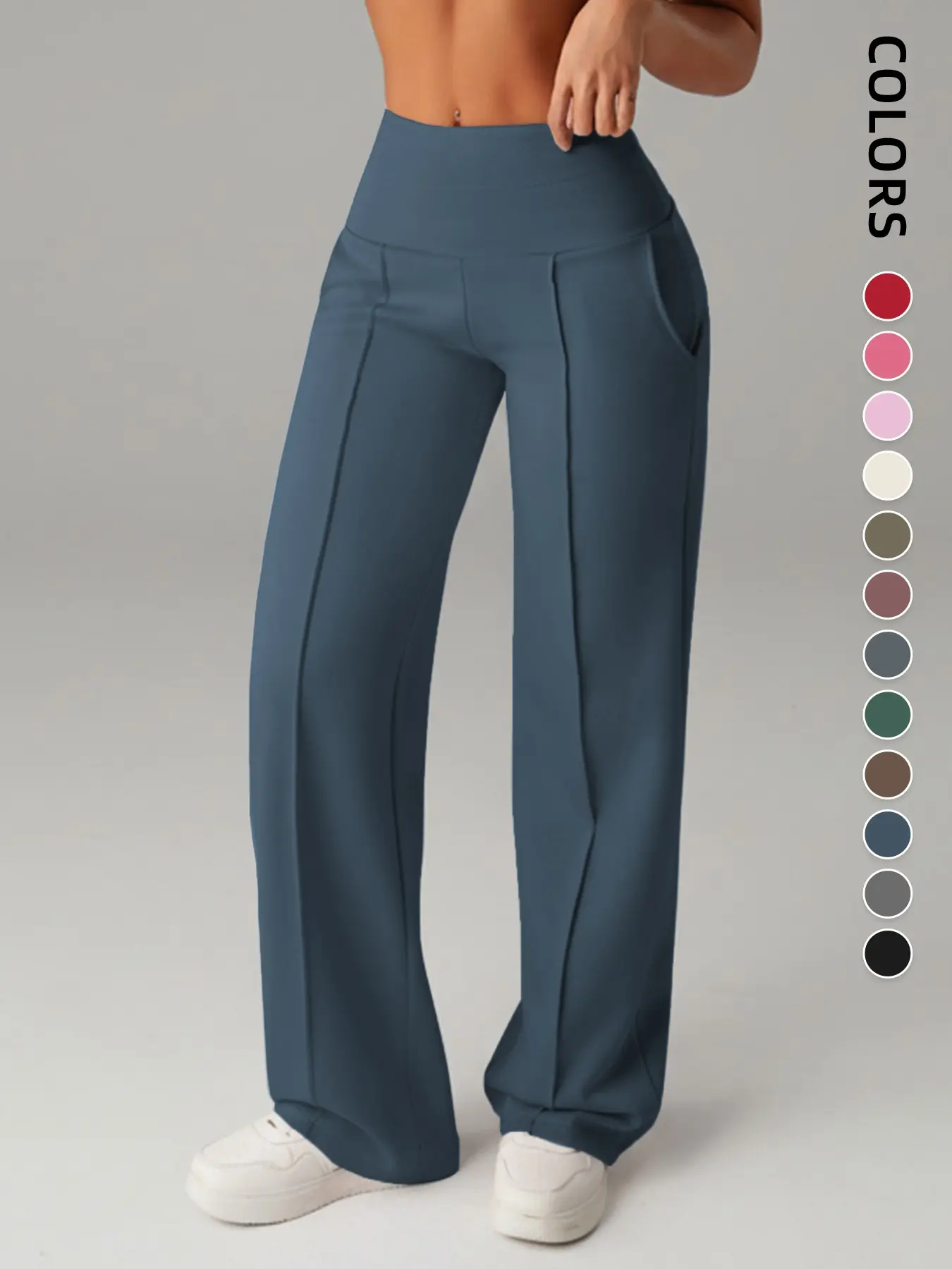 Pantalones de mujer de tiro medio, cintura elástica y pernera ancha; estilo deportivo casual, cómodos bolsillos laterales; prenda versátil para primavera y otoño; ideales para el día a día; moda femenina.